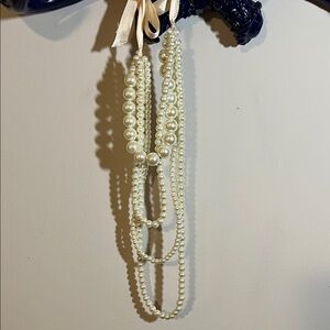 Express Multi strand pearly necklace